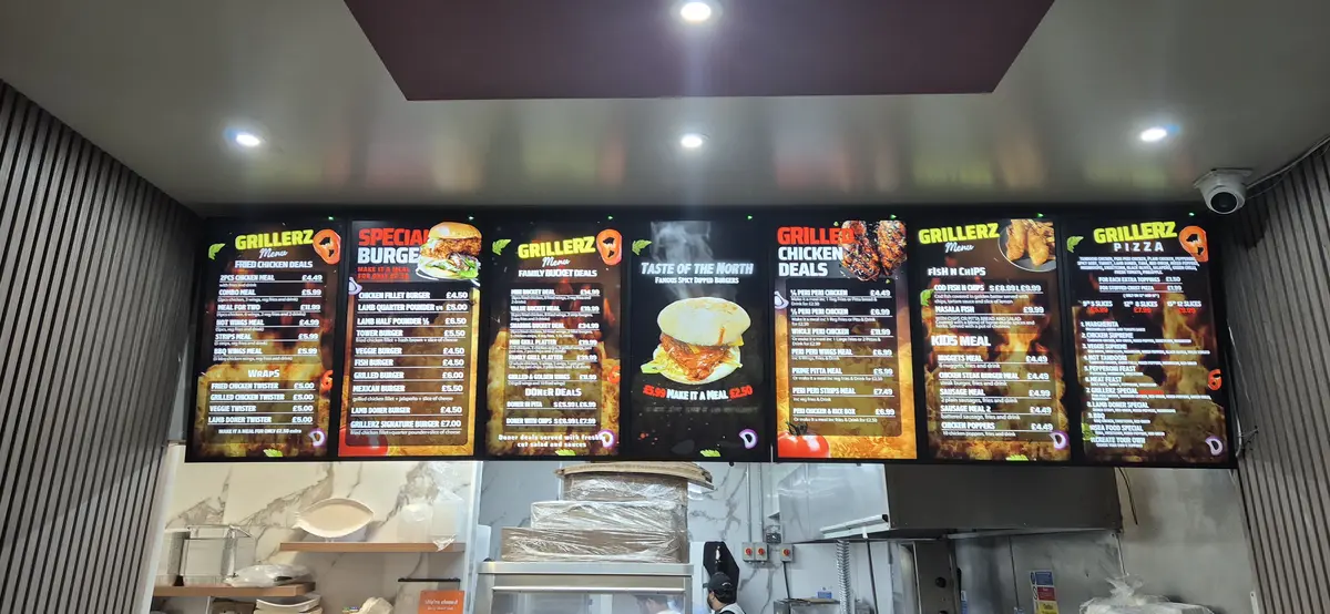 Multi-screen digital signage installation in a fast food restaurant.