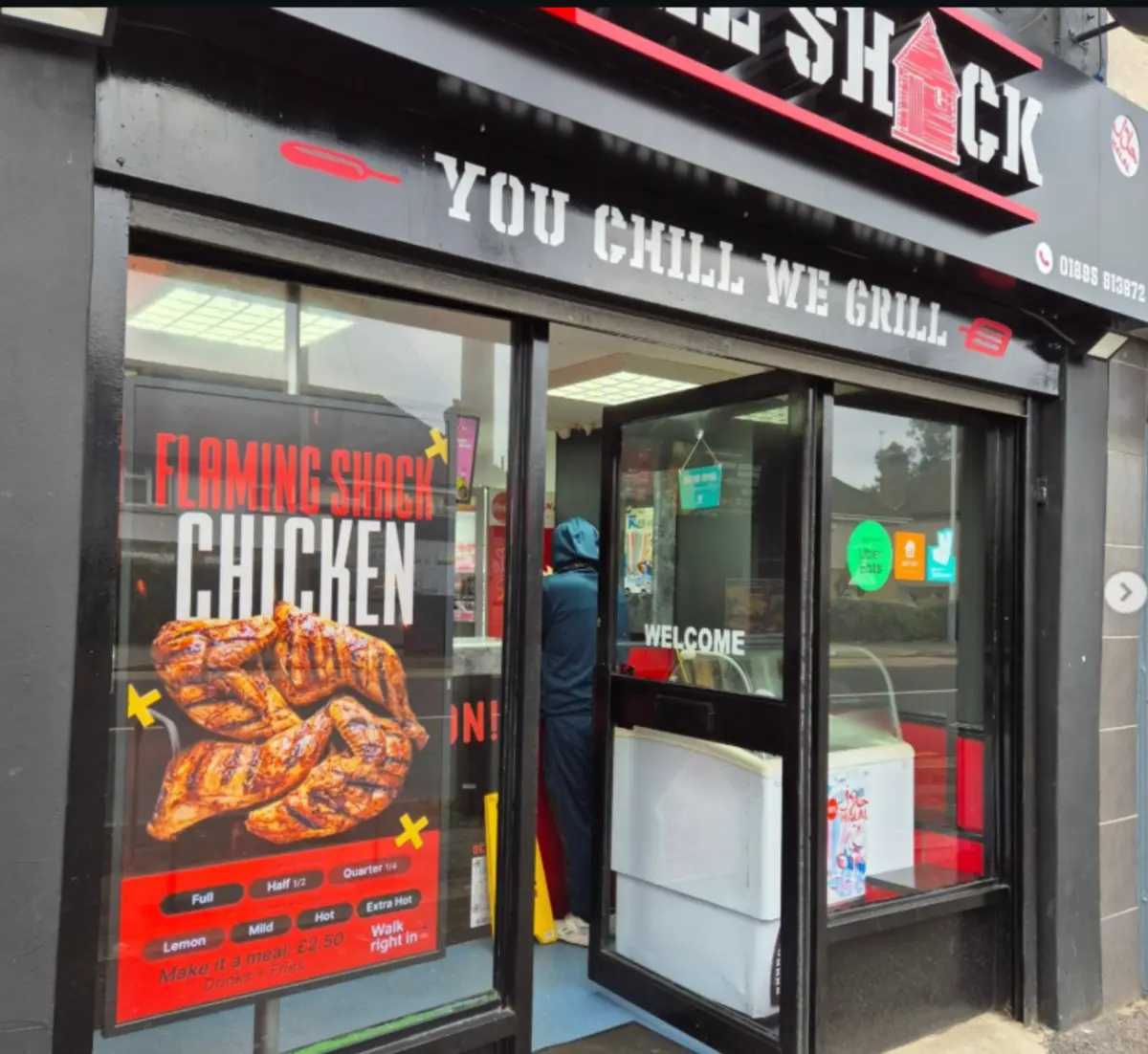 Eye-catching digital signage in a UK fast food takeaway.